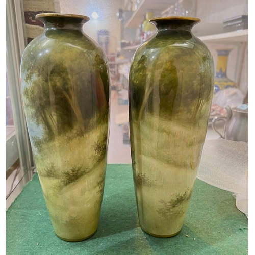 591 - A pair of Royal Bonn porcelain vases of baluster form, hand painted with young women with flowers in... 