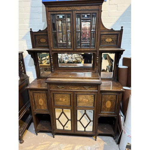 887 - A 19th century full height rosewood side cabinet with mirror back and extensive marquetry inlay, the... 