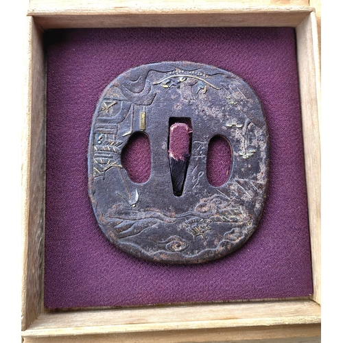 295B - An 18th century Japanese mixed metal Tsuba in presentation box, signed