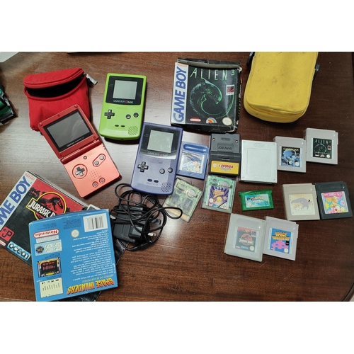 314A - Two Nintendo Game Boy Colors, a Game Boy Advance SP, various games, Pokemon Blue, Emerald, etc