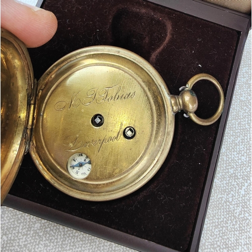 699 - An unusual Liverpool open faced brass cased pocket watch with white enamel dial, with hidden compass... 