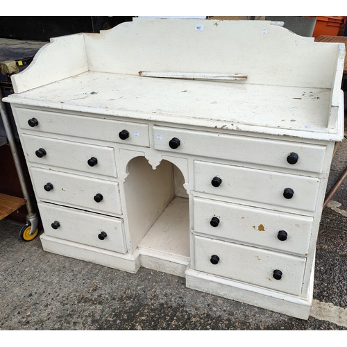 883 - A Victorian pine painted side cabinet with 8 drawers below, length 123cm