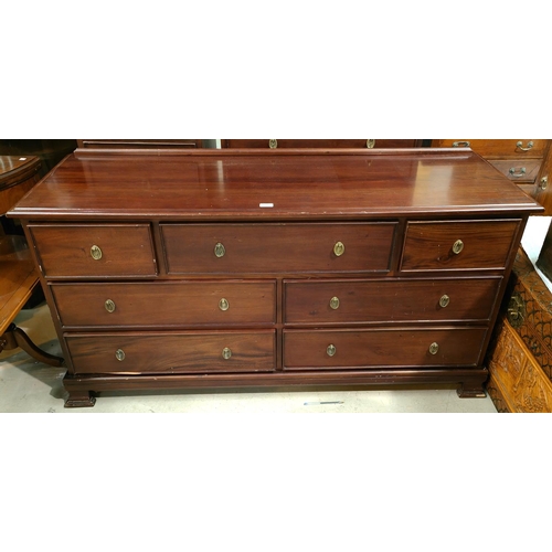 952 - A reproduction narrow mahogany 7  drawer side cabinet