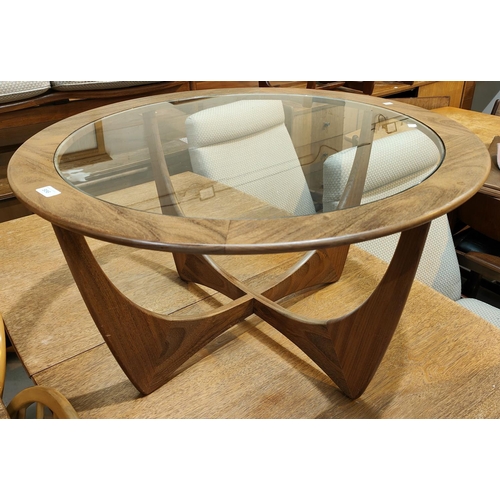 956 - A circular 1960's G-Plan style teak coffee table