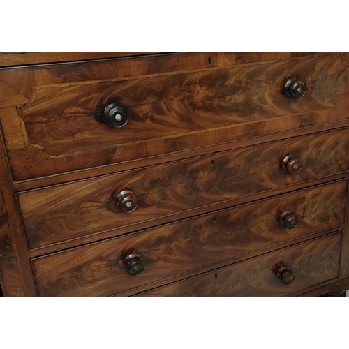 993 - A 19th century mahogany chest of 4 long drawers and concealed frieze drawer, knob handles and turned... 