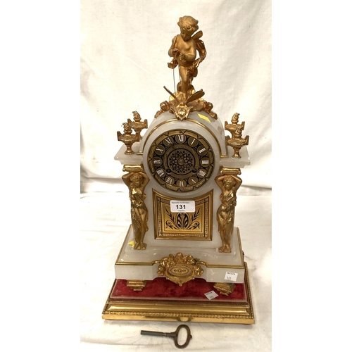 131 - A Louis XVI style white marble mantle clock with gilt metal cherub finial and mounts with base and s... 