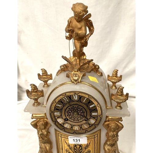 131 - A Louis XVI style white marble mantle clock with gilt metal cherub finial and mounts with base and s... 