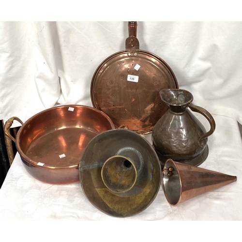 139 - A copper warming pan and a copper pan with side handles and other copper ornaments