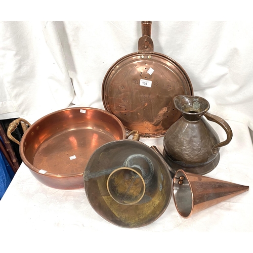 139 - A copper warming pan and a copper pan with side handles and other copper ornaments