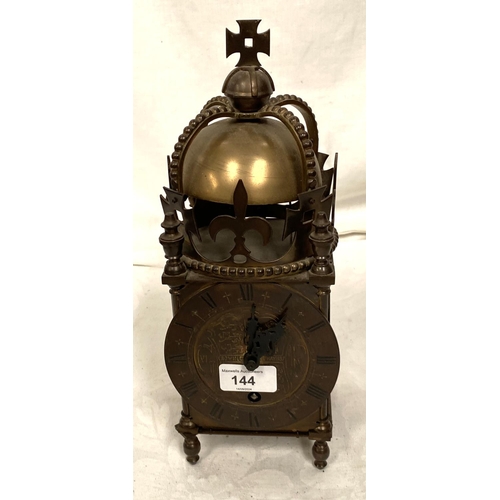 144 - A late 19th early 20th century brass lantern clock with balance spring movement