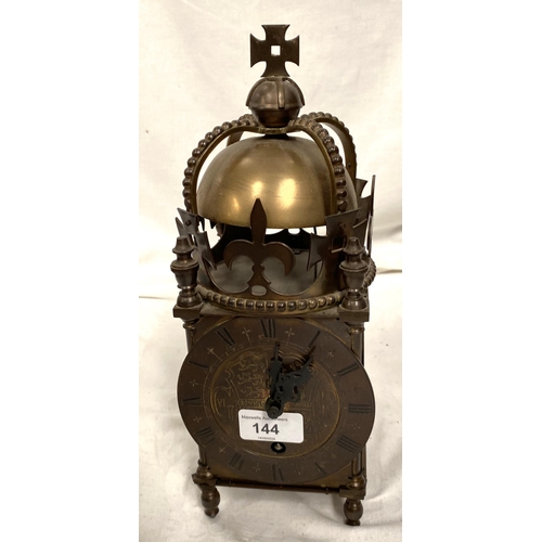 144 - A late 19th early 20th century brass lantern clock with balance spring movement