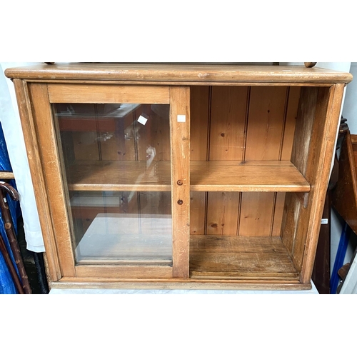 145 - 2 wall hanging pine plate racks; a 2 division cutlery tray ; a small glazed pine wall cupboard