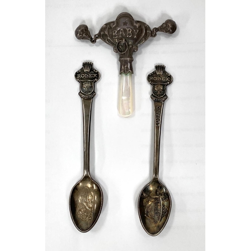 156 - Two white metal Rolex Bucherer teaspoons with Rolex crown finials and a white metal and mother of pe... 