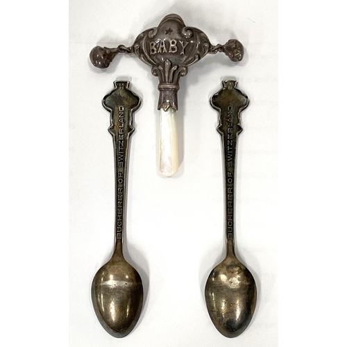 156 - Two white metal Rolex Bucherer teaspoons with Rolex crown finials and a white metal and mother of pe... 