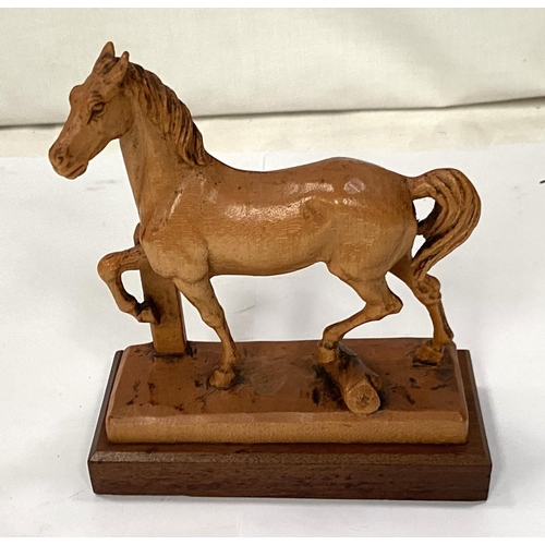 160 - A carved horse possibly by Faust, Wharton & Lang, length 12cm on plinth