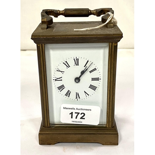 172 - A late 19th/early 20th century brass carriage clock with timepiece movement by Dent, Pall Mall, Lond... 