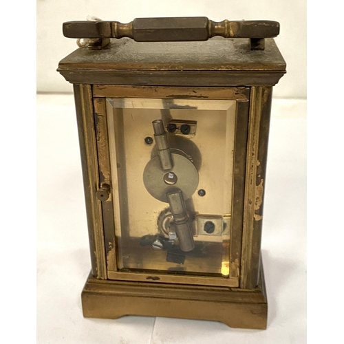 172 - A late 19th/early 20th century brass carriage clock with timepiece movement by Dent, Pall Mall, Lond... 