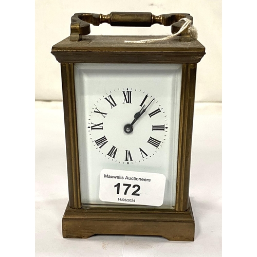 172 - A late 19th/early 20th century brass carriage clock with timepiece movement by Dent, Pall Mall, Lond... 