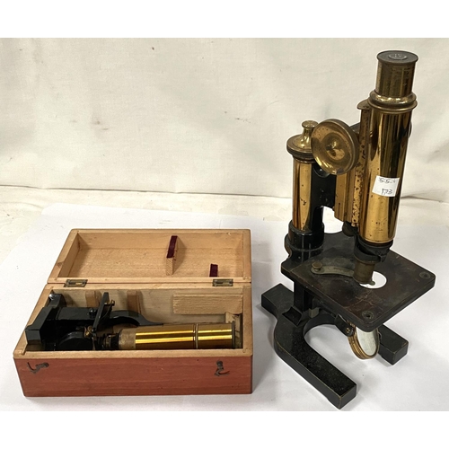 173 - A microscope with 2 lenses by Watson & Son; a small travel microscope in wooden case