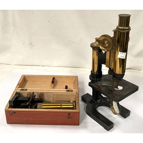 173 - A microscope with 2 lenses by Watson & Son; a small travel microscope in wooden case