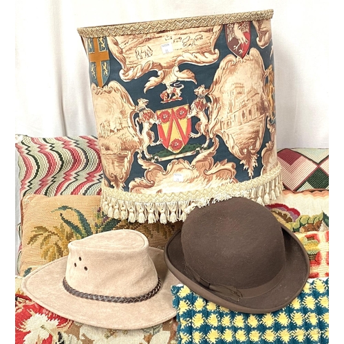 23 - A brown bowler hat; an Australian leather hat; a period style lampshade; a selection of cushions wit... 