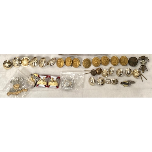 252 - A collection of military shoulder badges on board, a collection of buttons etc and books including f... 