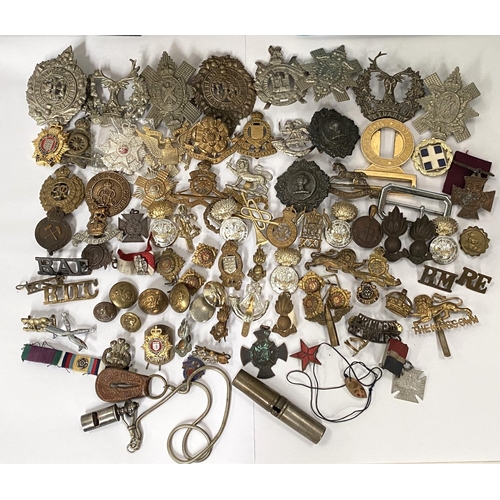 256 - A collection of military badges including King Own Scottish Borders, Argyll and Sutherland etc, thre... 