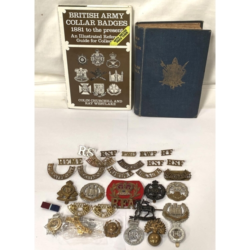 258 - A collection of military shoulder badges and buttons etc and a book on badges