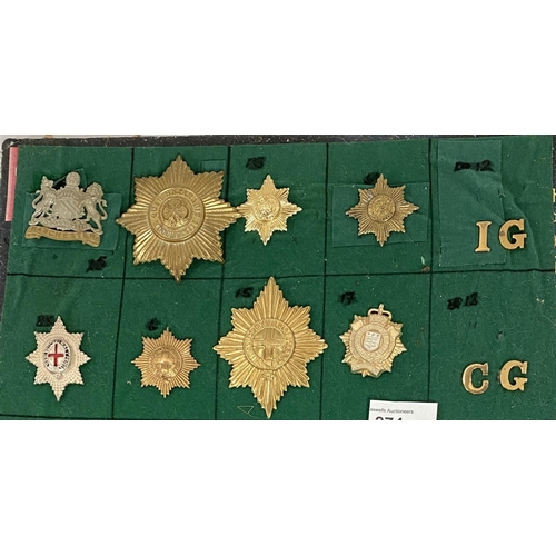 274 - A collection on board of Military guard badges, Manchester etc