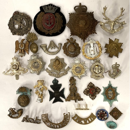 275 - A collection of military badges