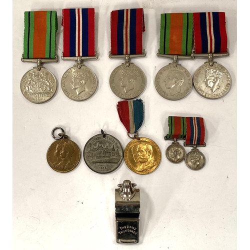 283 - A collection of pairs of World War II medals, a pair of miniatures, whistle etc