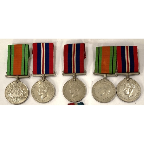 283 - A collection of pairs of World War II medals, a pair of miniatures, whistle etc