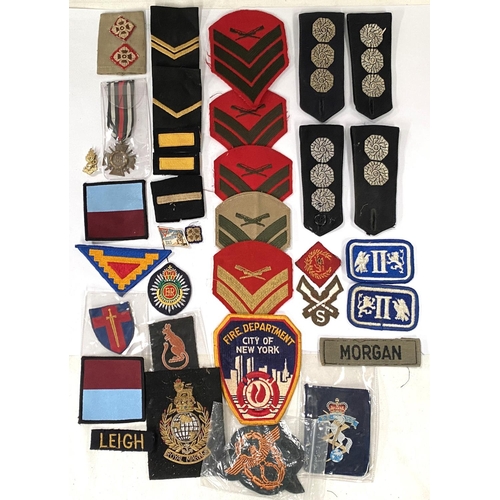 285 - A collection of various military cloth shoulder badges, Military etc