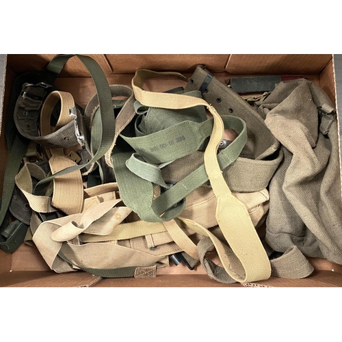 289 - A collection of military canvas pouches, webbing belts etc