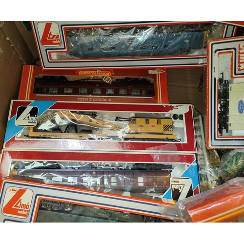 324 - A collection of Hornby and Lima boxed carriages, trucks etc 