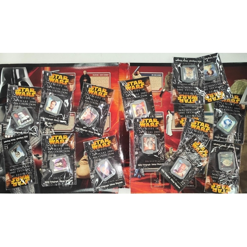 333 - STAR WARS: a collection of Star Wars Episode III pins, R2-D2  boxed tea pot, clocks, bomber and othe... 