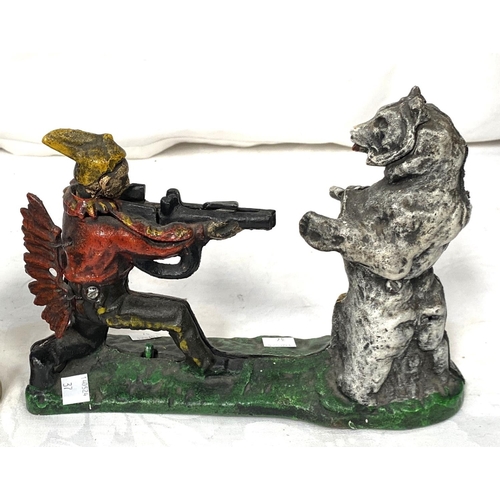37 - A miner's lamp by Ackroyd Best, a Victorian style cast iron novelty money box, man shooting bear