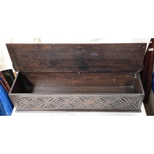 41 - A 19th century carved oak wall hanging candle box
