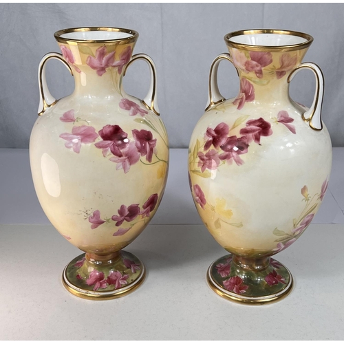 412 - A pair of late 19th/early 20th century baluster vases by Crescent decorated with roses; a musical Ge... 