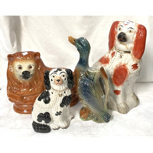 47 - A large 19th century Staffordshire dog (a.f), a smaller dog, cat and duck