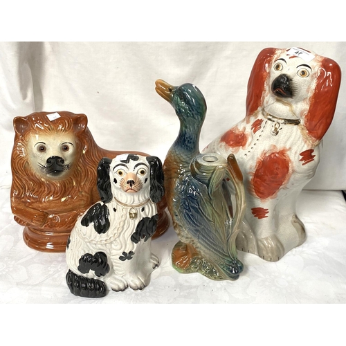 47 - A large 19th century Staffordshire dog (a.f), a smaller dog, cat and duck