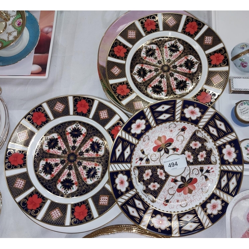 494 - 3 Royal Crown Derby Imari pattern plates, a collection of cake plates, Christmas Yule plates etc