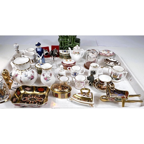 498 - A miniature Royal Crown Derby cup and saucer, iron, wheel barrow and other miniature items