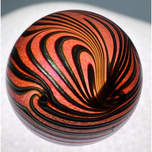 503 - Paperweights: Six small paperweights all with coloured lustre surfaces with various decoration, ones... 