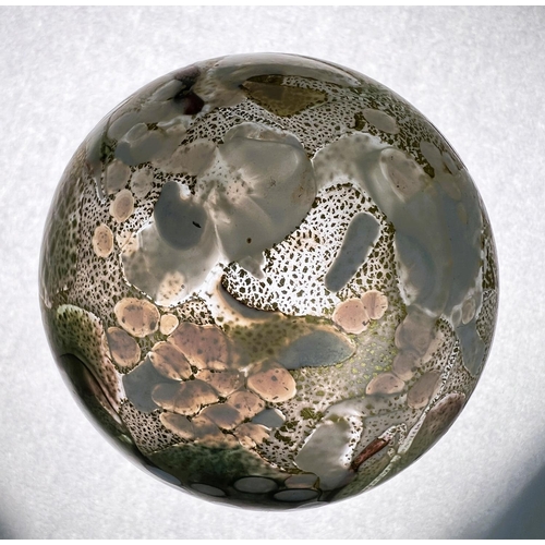 510 - Isle of Wight Glass: three labelled paperweights with gold leaf and varying colours and an iridescen... 