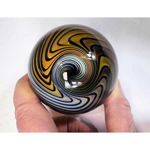 514 - An unusual giant glass marble, with swirling vortex illusion inside, monogramed K to base, diameter ... 