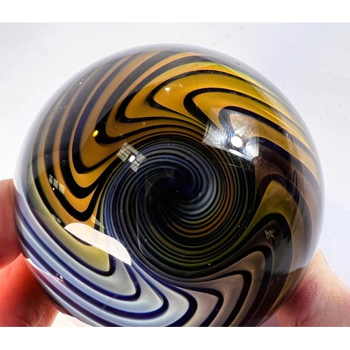 514 - An unusual giant glass marble, with swirling vortex illusion inside, monogramed K to base, diameter ... 