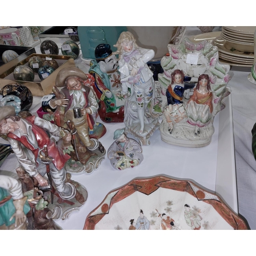 522 - A collection of 19th century style figures, Staffordshire style, other decorative pottery etc 