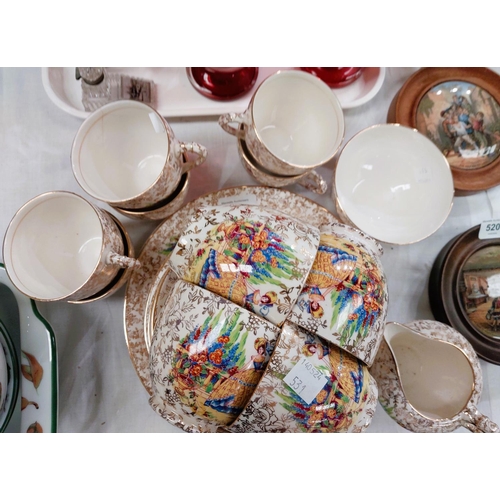 531 - A 1930's gilt part tea set decorated with Crinoline ladies, approx. 35 pieces