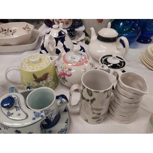 534 - A collection of teapots and decorative china